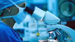 Doctor Looking in Microscope