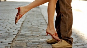 Man Lifting Woman on Street